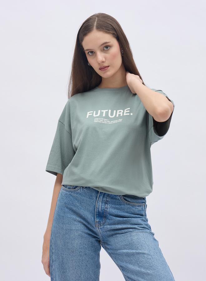 Styli Women Green Slogan Print Short Sleeve Oversized T-Shirt - Image 1